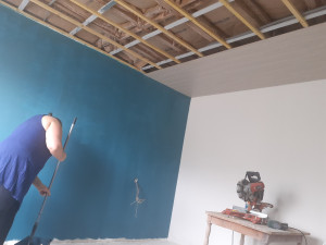 Photo de galerie - Réalisation faux plafond isolation et lambris 