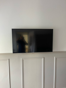 Photo de galerie - Fixation TV au mur