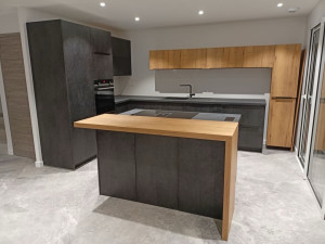 Photo de galerie - Pose de cuisine avec îlot central, réaliser chez un client en 2jour 