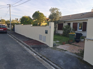 Photo de galerie - Réalisation d'un enduit taloché