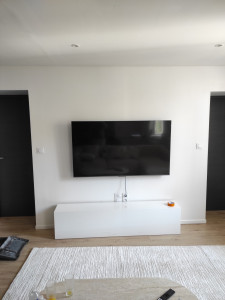 Photo de galerie - Installation d'une télé avec une fixation murale 