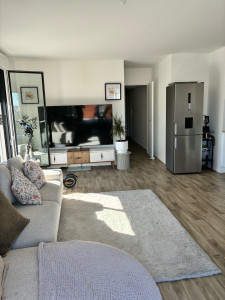 Photo de galerie - Salon d’un appartement 