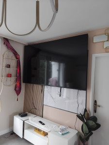Photo de galerie - ACCROCHÉ TV AU MUR 
