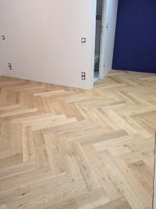 Photo de galerie - Pose de parquet baton rompu après
