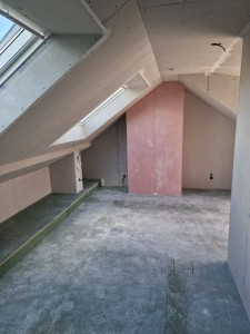 Photo de galerie - Réalisation de cloisons, doublage des pignons, isolation, habillage de Velux...