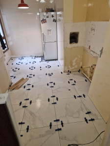 Photo de galerie - Remplacement de sol en carrelage 