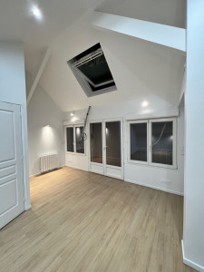 Photo de galerie - Rénovation complète après une surélévation 