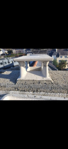 Photo de galerie - Pause d'un chapeau de cheminée suite à une tempête