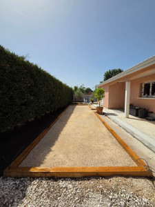 Photo de galerie - Réalisation d'un terrain de pétanque en calcaire