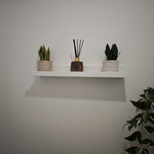 Photo de galerie - Installation étagère décoration 