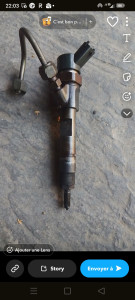 Photo de galerie - Changement de injecteur et reprogrammation 