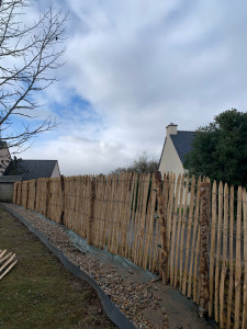 Photo de galerie - Pose de toile de paillage+pierre roule de Riviere 