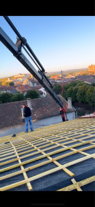 Photo de galerie - Mise à disposition de tuile sur toiture 