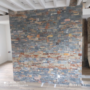 Photo de galerie - Pose carrelage mural de salon