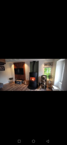 Photo de galerie - Pose de poële à bois + casquette placo + luminaire + peinture