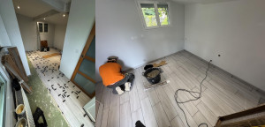 Photo de galerie - Pose de carrelage grand format imitation parquet avec cales de nivellement pour un rendu parfaitement aligné.
Finitions réalisées avec plinthes assorties pour un résultat propre, moderne et durable.