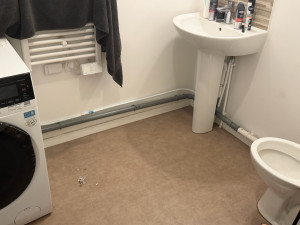 Photo de galerie - Création d’une évacuation et d’arrivée d’eau pour machine à laver