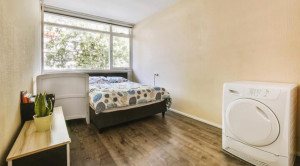 Photo de galerie - Rangement d’une chambre 