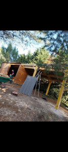 Photo de galerie - Création d'un carport en bois avec toiture 