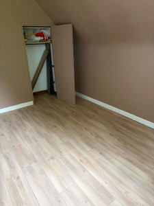 Photo de galerie - Pose parquet stratifié bois 