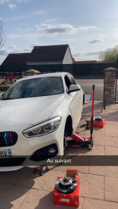 Photo de galerie - Remplacement disques et plaquettes avant et arrière 