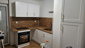 Photo de galerie - Installation de cuisine équipée 
