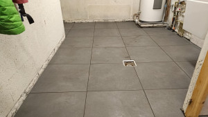 Photo de galerie - Carrelage d'une buanderie 
