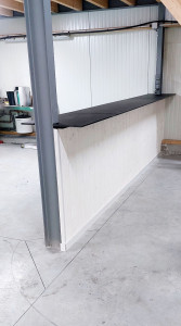 Photo de galerie - Habillage muret en parpaing pour création d'un comptoir.