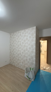 Photo de galerie - Pose d’un papier peint à motif et raccords 