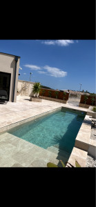 Photo de galerie - Pose de pierre naturel travertin piscine et terrasse 