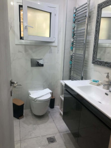 Photo de galerie - Menage de la sale de bain