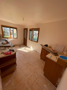 Photo de galerie - Le sol d’une cuisine avant de poser nouveau carrelage 