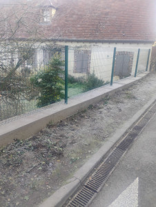 Photo de galerie - Création d'une clôture dans un coffrage béton 