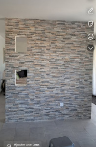 Photo de galerie - Cloison placo avec habillage parements en pierre