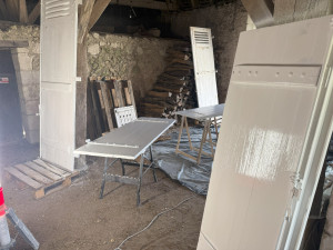Photo de galerie - Restauration et peinture sur volets 
