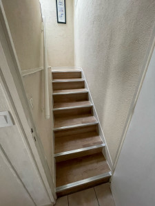 Photo de galerie - Habillage d’un escalier, avec du parquet flottant