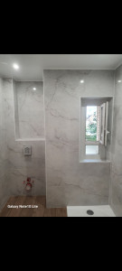 Photo de galerie - Pose parquet, carrelage mur et sol
