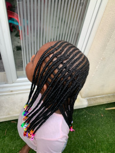 Photo de galerie - Coiffure pour enfants (nattes)