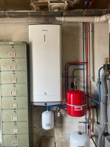 Photo de galerie - Pose et installation d’un ballon d’eau chaude plat électrique 