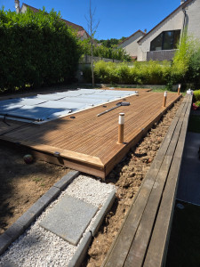 Photo de galerie - Piscine avec terrasse en bois