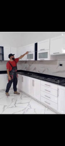 Photo de galerie - Installation meuble de cuisine