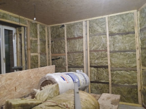 Photo de galerie - Pose d une ossature bois plus isolation.