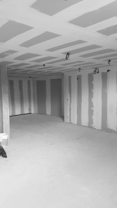 Photo de galerie - Réalisation collage de bande + charge + finition 