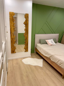 Photo de galerie - Pose de parquet, réalisation de la tête de lit et montage du dressing 