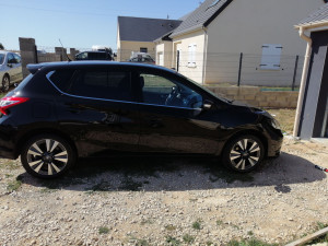 Photo de galerie - Véhicule noir lustré pour une vente d'un client 