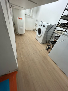 Photo de galerie - Pose parquet buanderie 