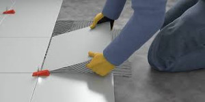 Photo de galerie - Pose carrelage, faience, margelle, régréage, joints expoxy, rénovation piscine, pose frise, pose crédecence cuisine, carrelage sdv