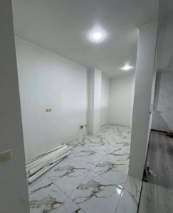 Photo de galerie - Rénovation du salon carrelage et peinture 