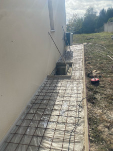 Photo de galerie - Préparation et feraiillage de dalle en béton 