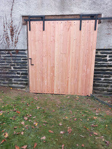 Photo de galerie - Porte de grange coulissante en douglas